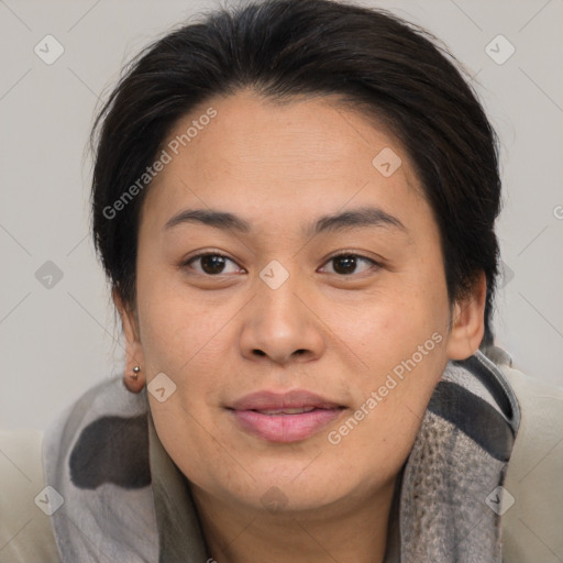 Joyful asian young-adult female with medium  brown hair and brown eyes