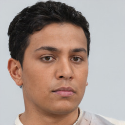 Neutral asian young-adult male with short  brown hair and brown eyes