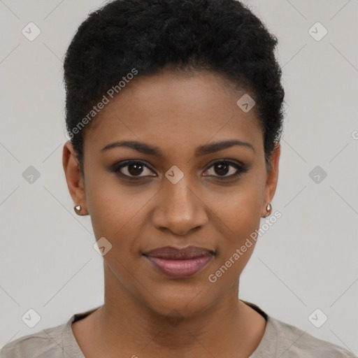 Joyful black young-adult female with short  black hair and brown eyes