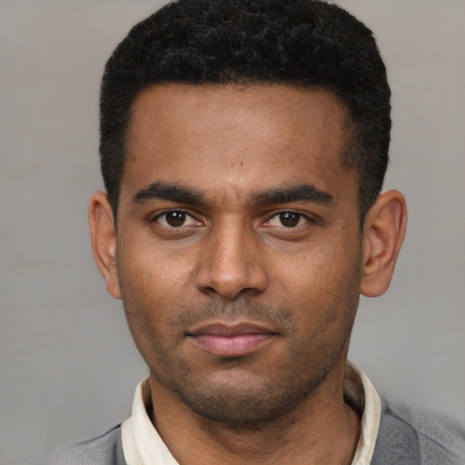 Neutral latino young-adult male with short  black hair and brown eyes
