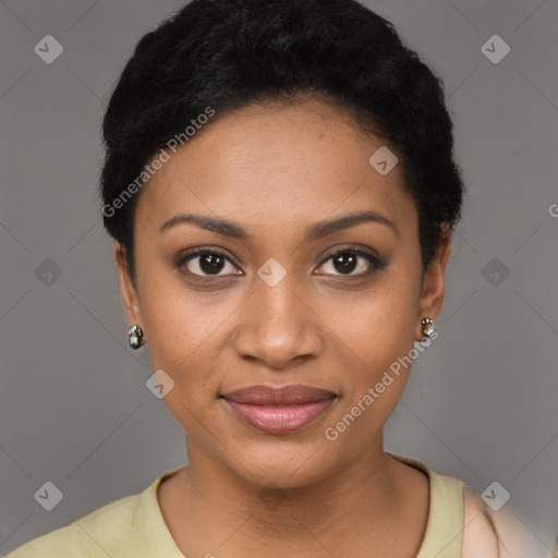 Joyful black young-adult female with short  black hair and brown eyes