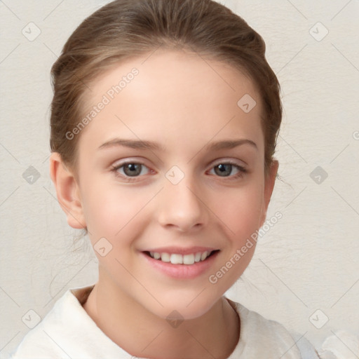 Joyful white child female with short  brown hair and brown eyes