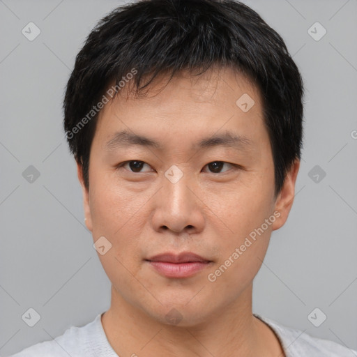 Neutral asian young-adult male with short  black hair and brown eyes