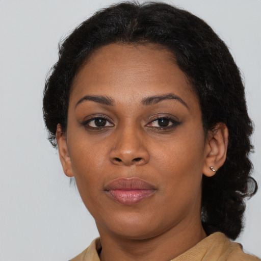 Neutral black young-adult female with short  brown hair and brown eyes