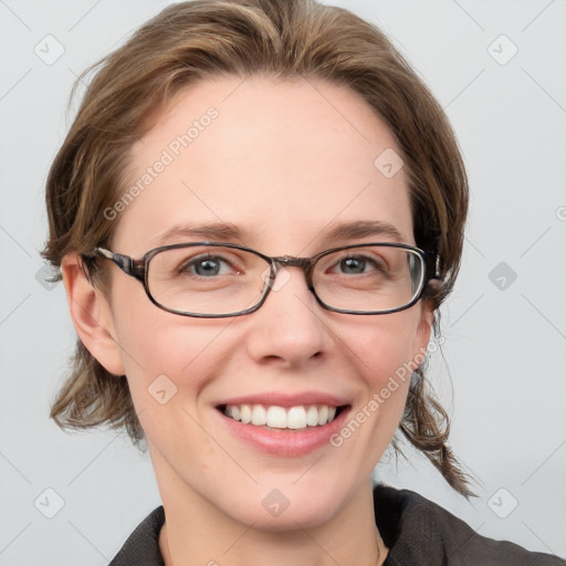 Joyful white young-adult female with medium  brown hair and blue eyes