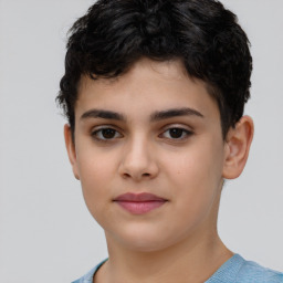 Joyful latino child female with short  brown hair and brown eyes