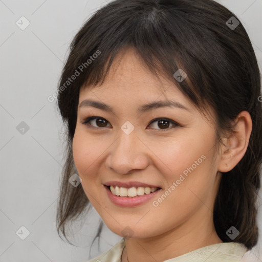 Joyful asian young-adult female with medium  brown hair and brown eyes