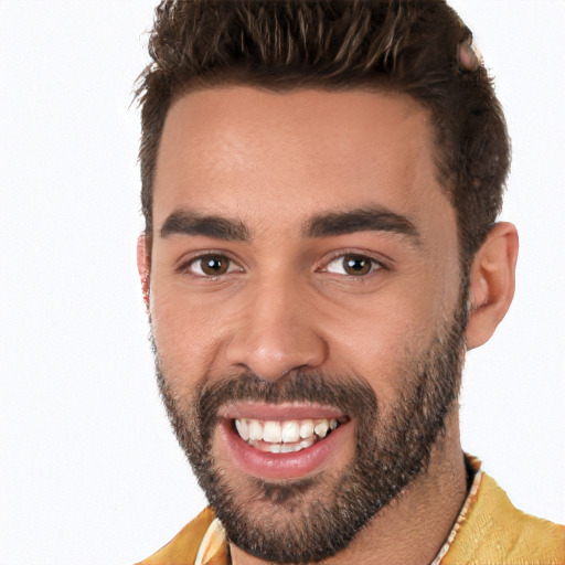 Joyful white young-adult male with short  black hair and brown eyes