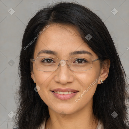 Joyful latino young-adult female with long  brown hair and brown eyes