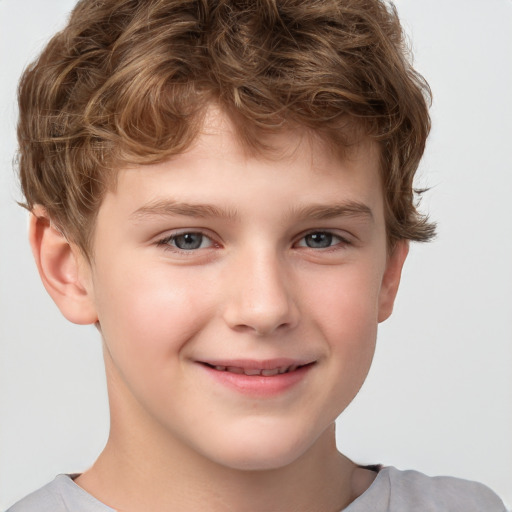 Joyful white child male with short  brown hair and brown eyes