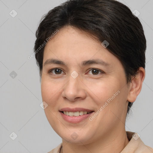 Joyful white adult female with medium  brown hair and brown eyes