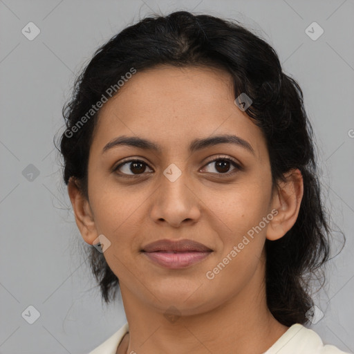 Joyful latino young-adult female with medium  brown hair and brown eyes