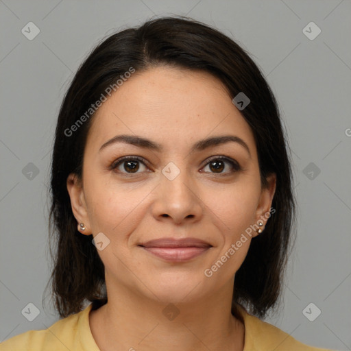 Joyful latino young-adult female with medium  brown hair and brown eyes