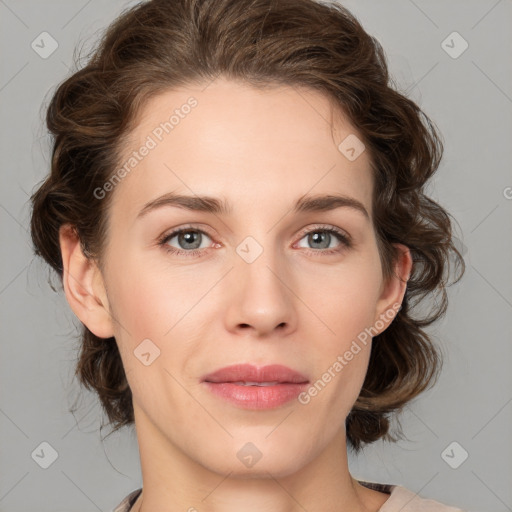 Joyful white young-adult female with medium  brown hair and green eyes