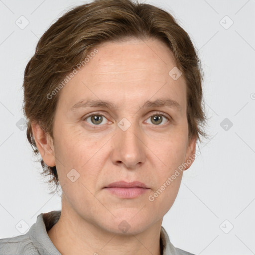 Joyful white adult male with short  brown hair and grey eyes