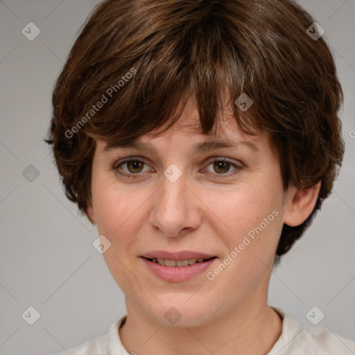 Joyful white adult female with short  brown hair and grey eyes