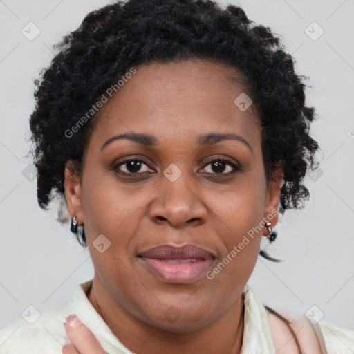 Joyful latino adult female with short  brown hair and brown eyes