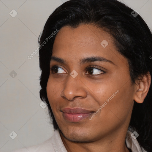 Joyful asian young-adult female with medium  black hair and brown eyes