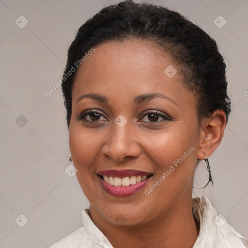 Joyful latino young-adult female with short  brown hair and brown eyes