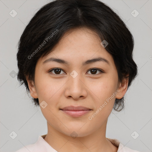 Joyful asian young-adult female with medium  black hair and brown eyes