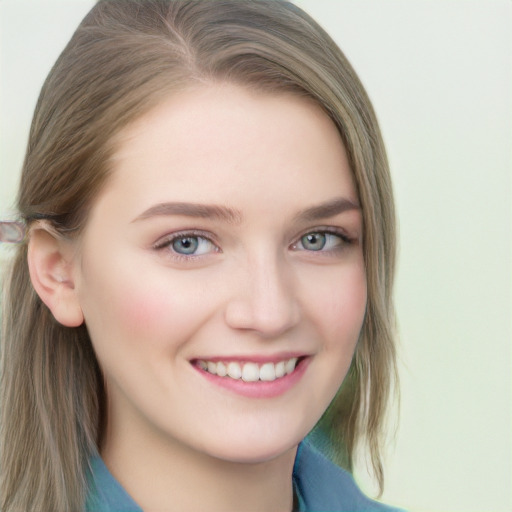 Joyful white young-adult female with long  brown hair and blue eyes