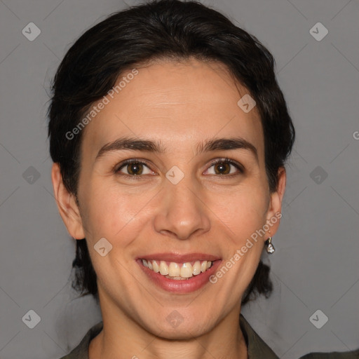 Joyful white young-adult female with medium  brown hair and brown eyes