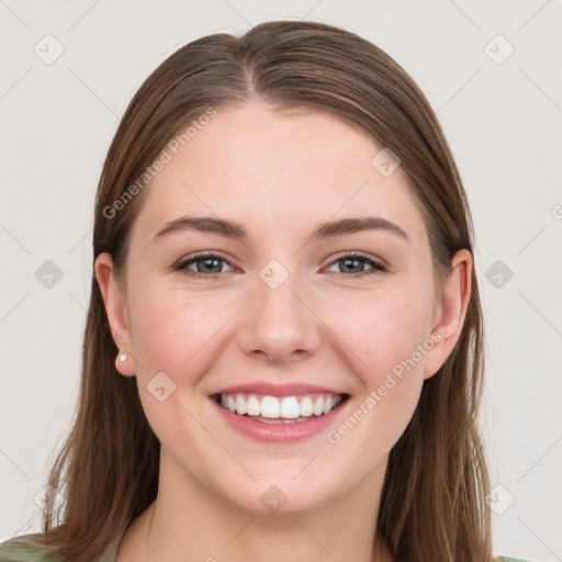 Joyful white young-adult female with long  brown hair and grey eyes