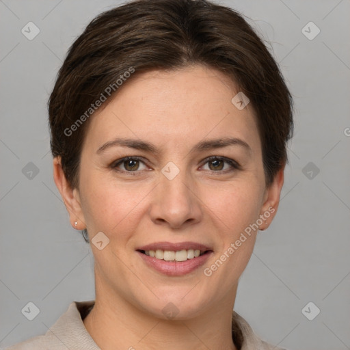 Joyful white young-adult female with short  brown hair and grey eyes