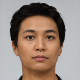 Neutral asian young-adult male with short  black hair and brown eyes