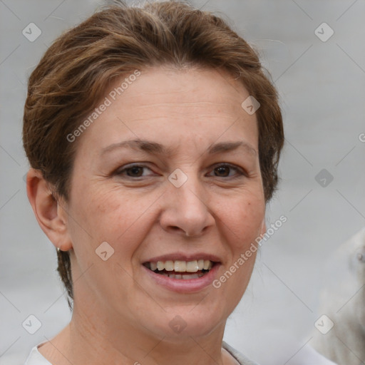 Joyful white adult female with short  brown hair and grey eyes