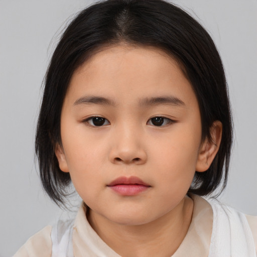 Neutral asian child female with medium  brown hair and brown eyes