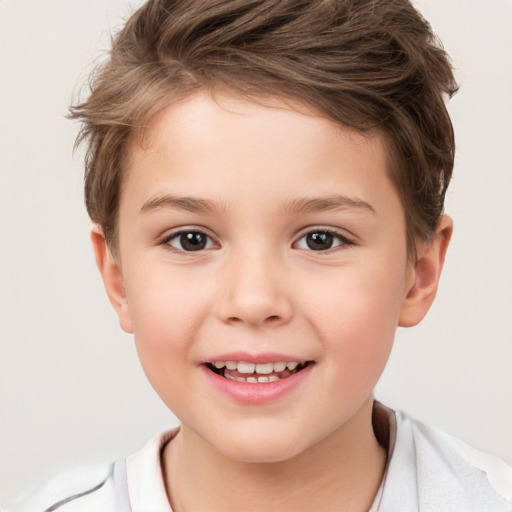 Joyful white child female with short  brown hair and brown eyes