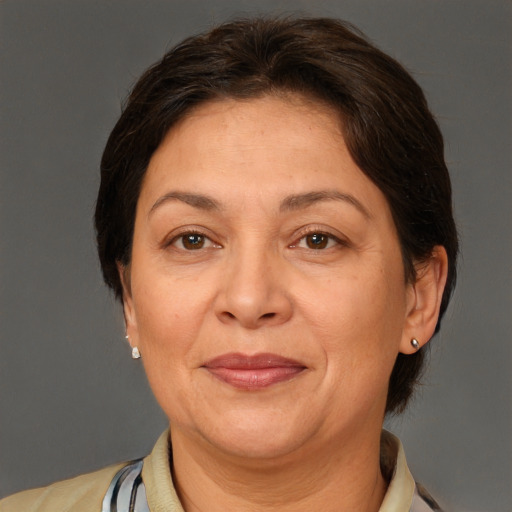 Joyful white adult female with short  brown hair and brown eyes
