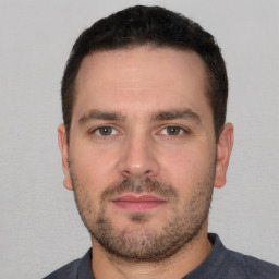 Neutral white young-adult male with short  brown hair and brown eyes