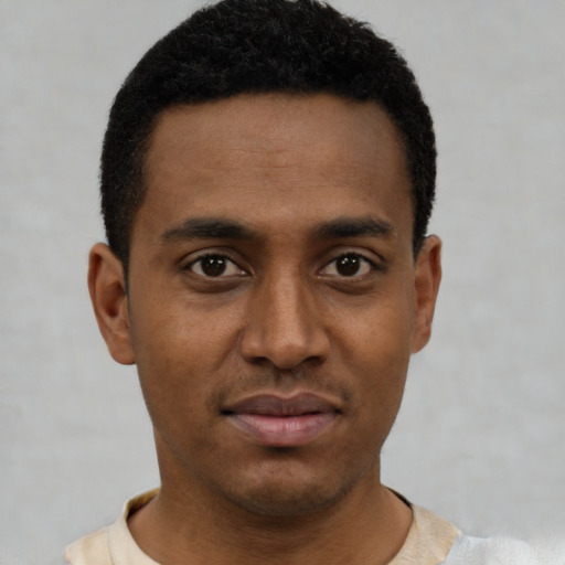 Neutral black young-adult male with short  brown hair and brown eyes