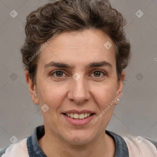 Joyful white adult female with short  brown hair and brown eyes