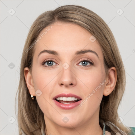 Joyful white young-adult female with long  brown hair and grey eyes