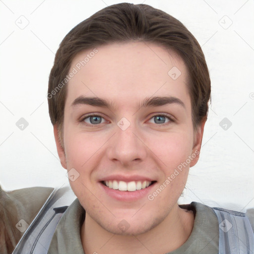 Joyful white young-adult female with short  brown hair and grey eyes