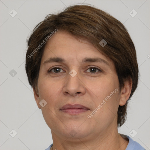 Joyful white adult female with short  brown hair and brown eyes