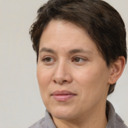 Joyful white adult female with short  brown hair and brown eyes