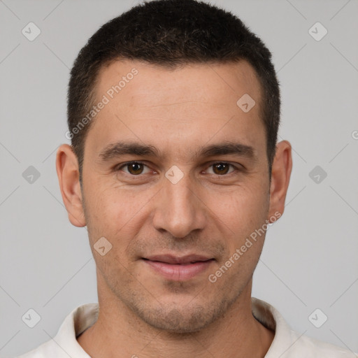 Joyful white young-adult male with short  brown hair and brown eyes