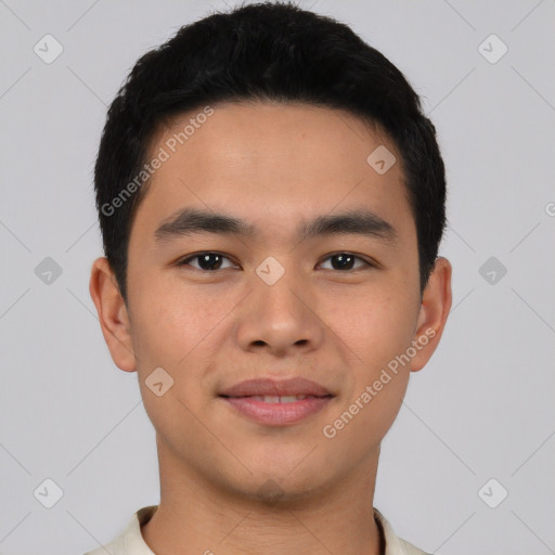 Joyful asian young-adult male with short  black hair and brown eyes