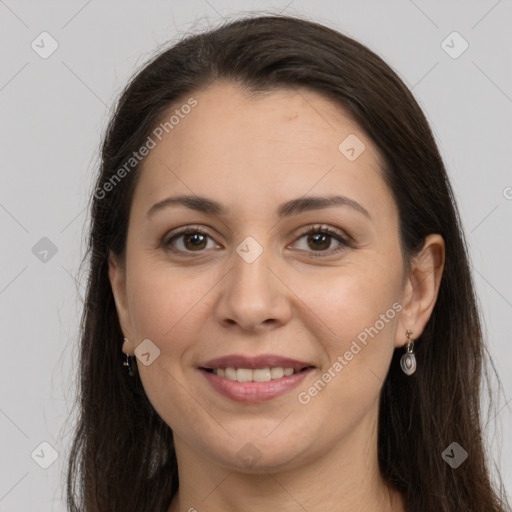 Joyful white young-adult female with long  brown hair and grey eyes