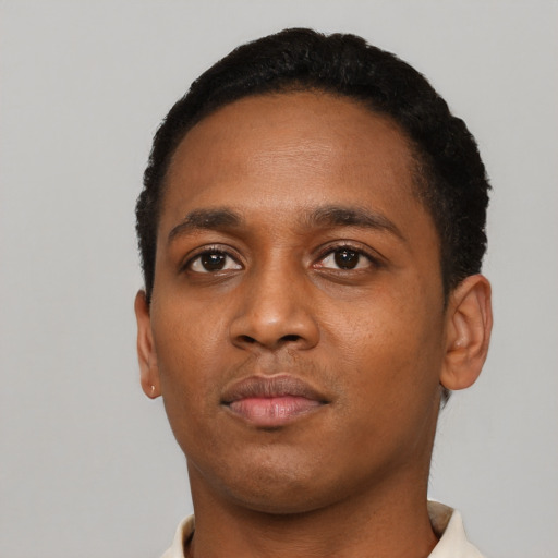 Neutral black young-adult male with short  black hair and brown eyes