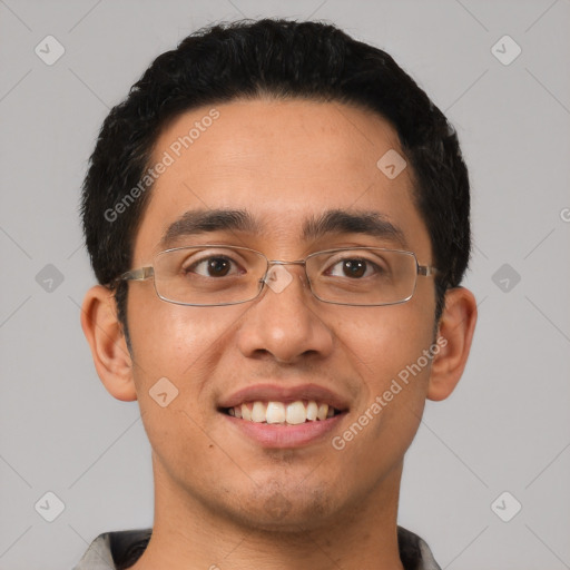 Joyful latino young-adult male with short  black hair and brown eyes