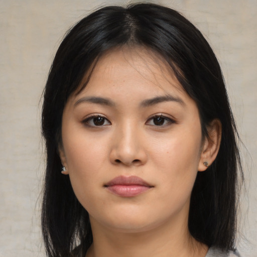 Neutral asian young-adult female with long  brown hair and brown eyes