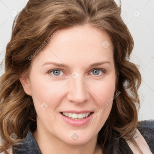 Joyful white young-adult female with long  brown hair and blue eyes