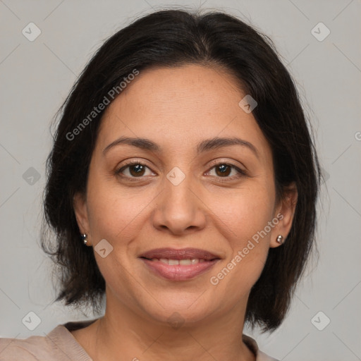 Joyful white adult female with medium  brown hair and brown eyes