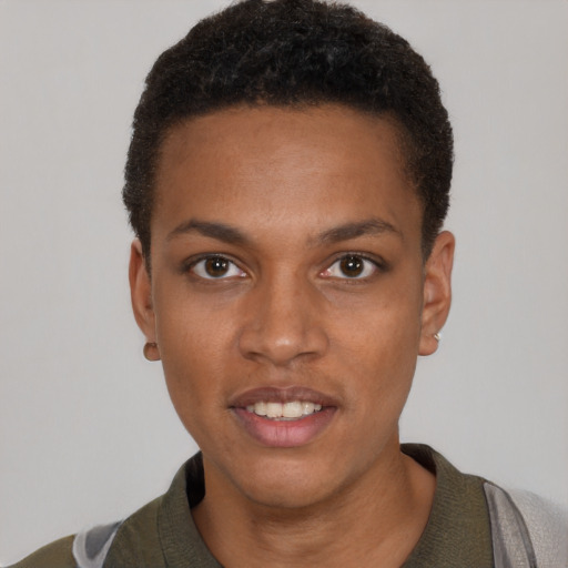 Joyful black young-adult male with short  brown hair and brown eyes