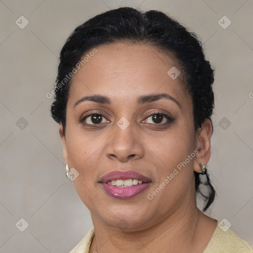 Joyful latino adult female with short  brown hair and brown eyes